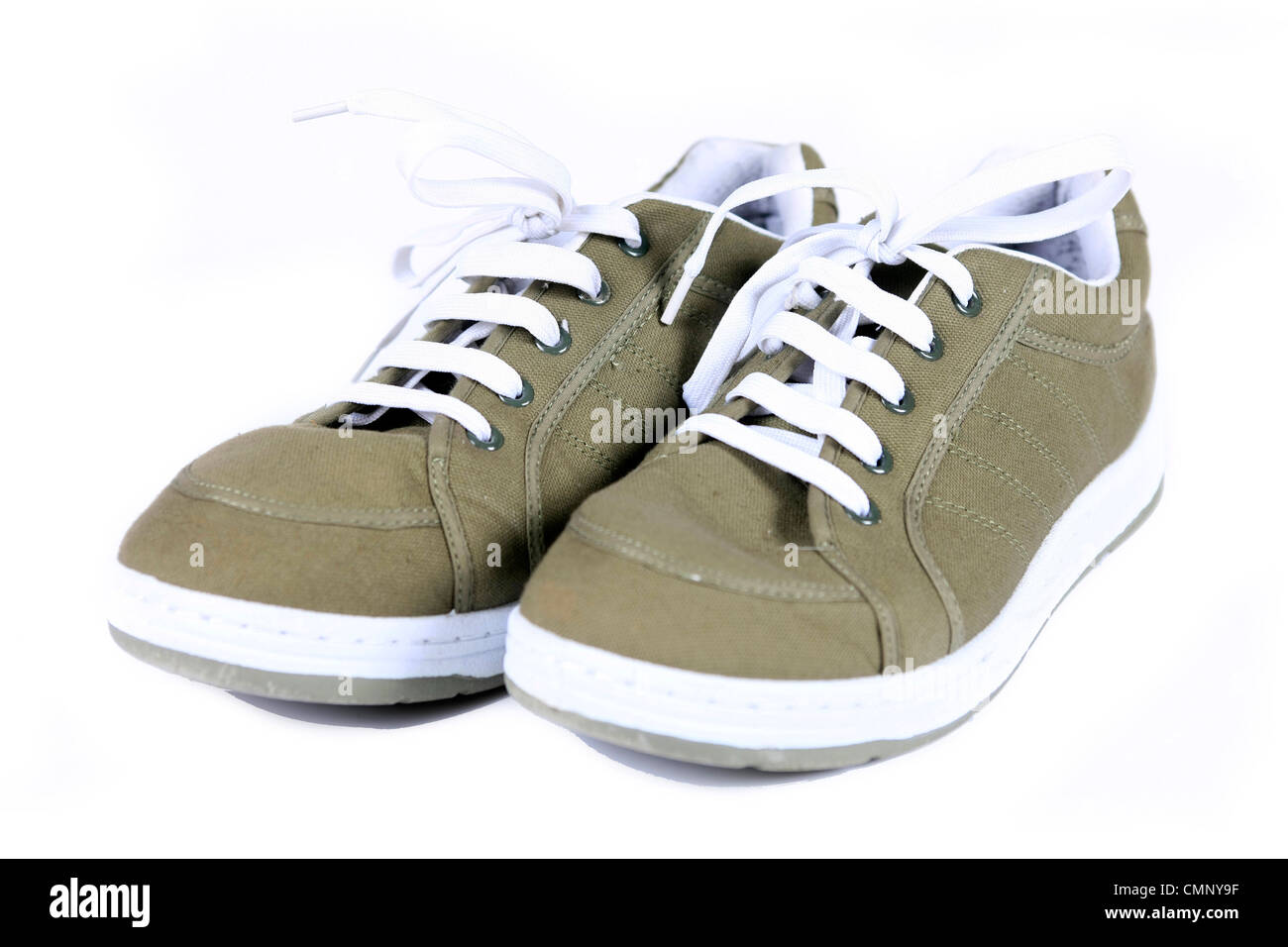 Grüne Leinwand Turnschuhe Schnür Schuhe Schuhe Stockfoto