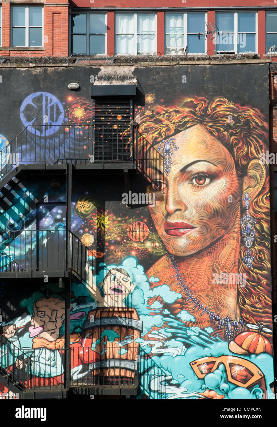 Wandbild an der Wand des Ridelow Bau im Northern Quarter, Manchester. Erstellt von der internationalen Kunst kollektive Subism. Stockfoto