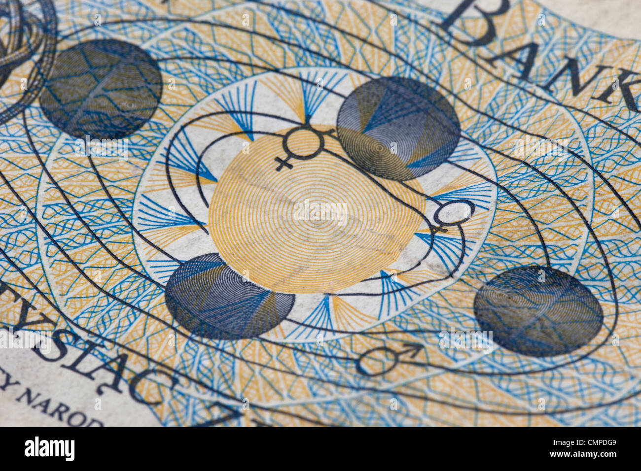 Detail des Sonnensystems Gravur mit der Erde in vier Positionen auf alten zerknitterten 1000 Zloty-Banknote aus Polen Stockfoto