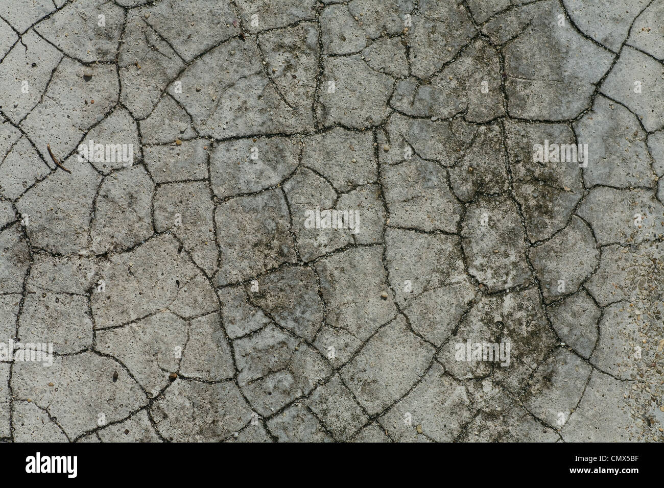 graue rissige Stein abstrakte Textur auf Straße Stockfoto
