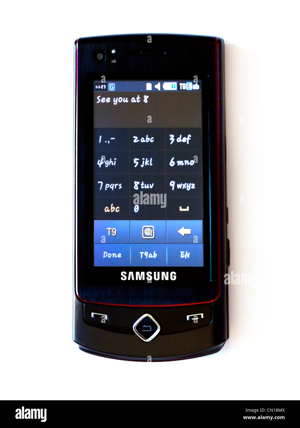 Handy Samsung Tocco mit Text Nachricht auf dem Bildschirm 'Auf Wiedersehen  bei 8' und Tastatur auf dem Touchscreen Stockfotografie - Alamy
