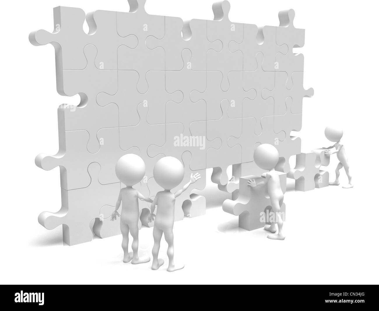 Geschäft Teamarbeit - Geschäftsleute machen eine Puzzle vor einem weißen Hintergrund Stockfoto