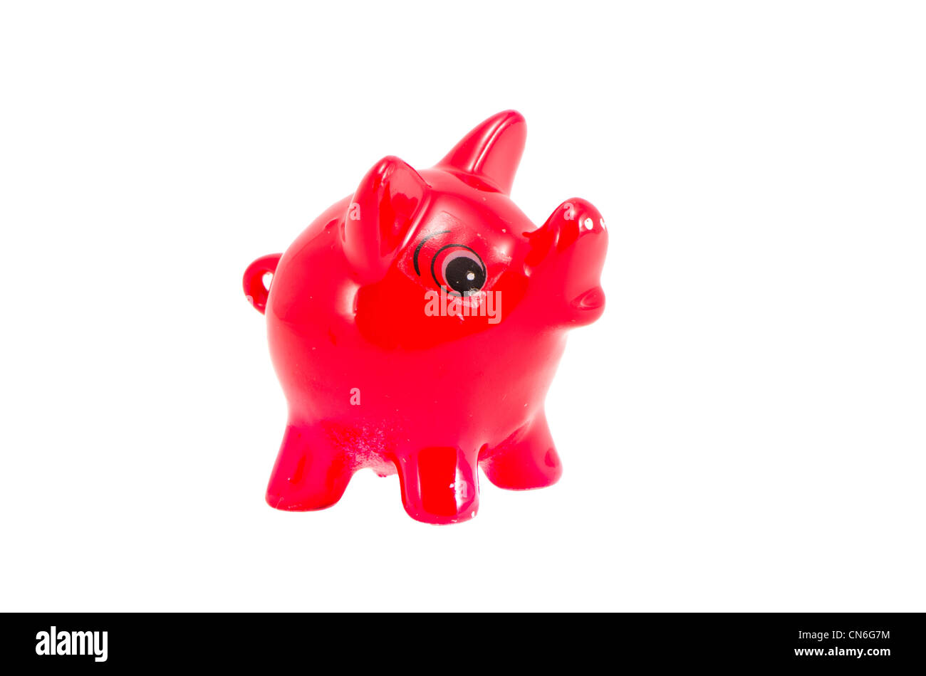 Isolierten roten Schwein Spardose auf weißem Hintergrund. Sparen Geld für schwarzer Tag. Notgroschen. Stockfoto