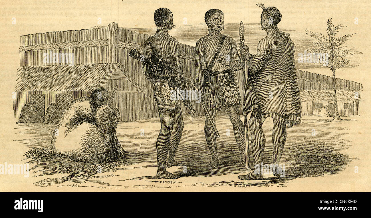 1854-Gravur, Gruppe Maories mit native Speer und Axt und ein Gewehr. Stockfoto