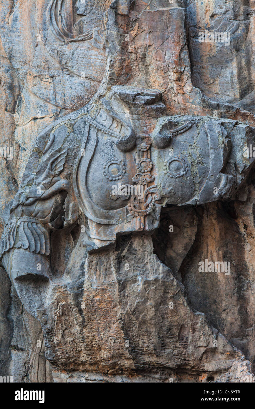 -Schaden Statuen am Longmen Grotten-Standort in China Stockfoto