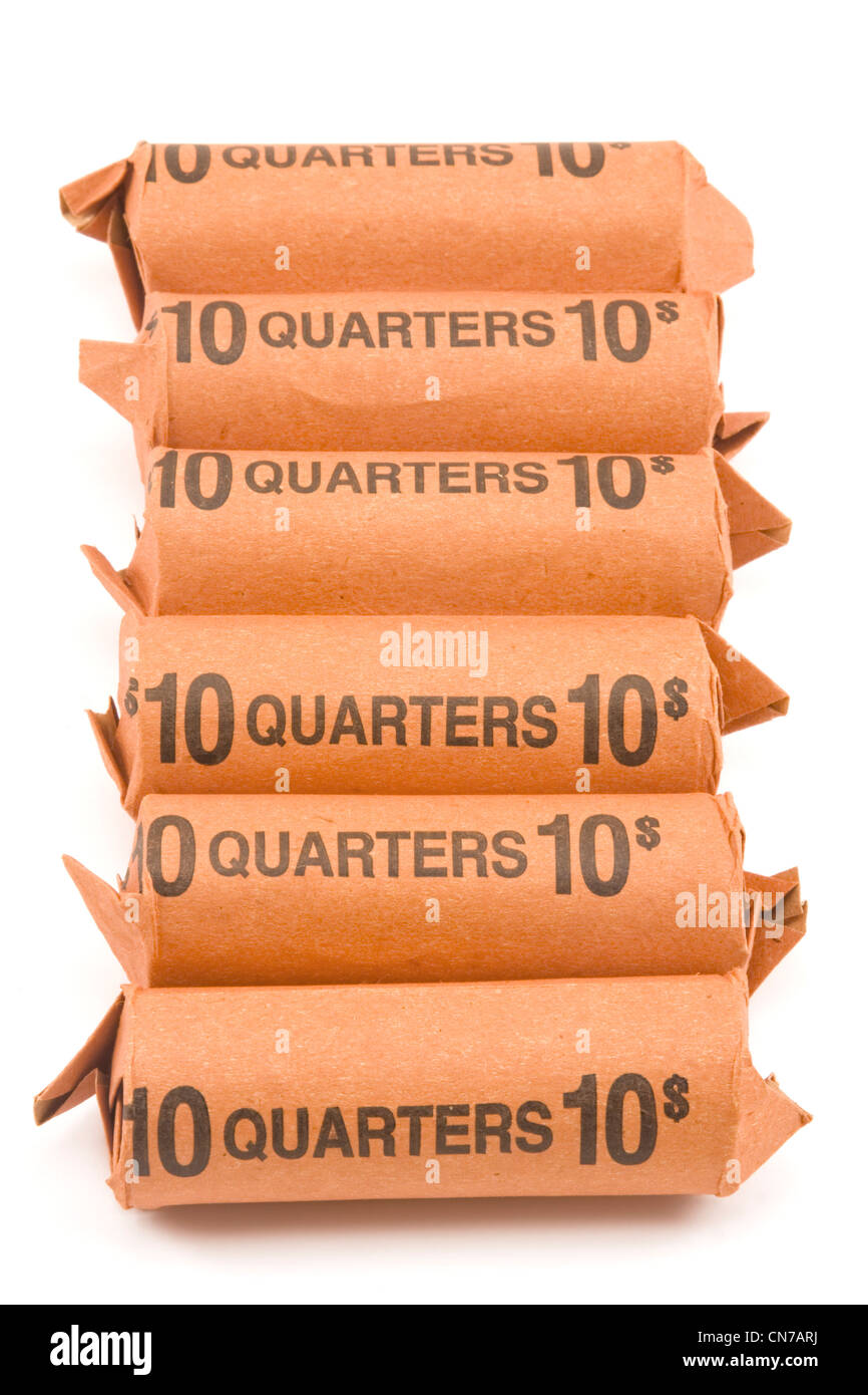 Rollen der amerikanischen Viertel auf weißem Hintergrund. Stockfoto