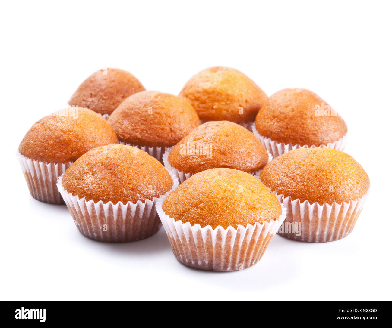 Frische Muffins isoliert auf weißem Hintergrund Stockfoto