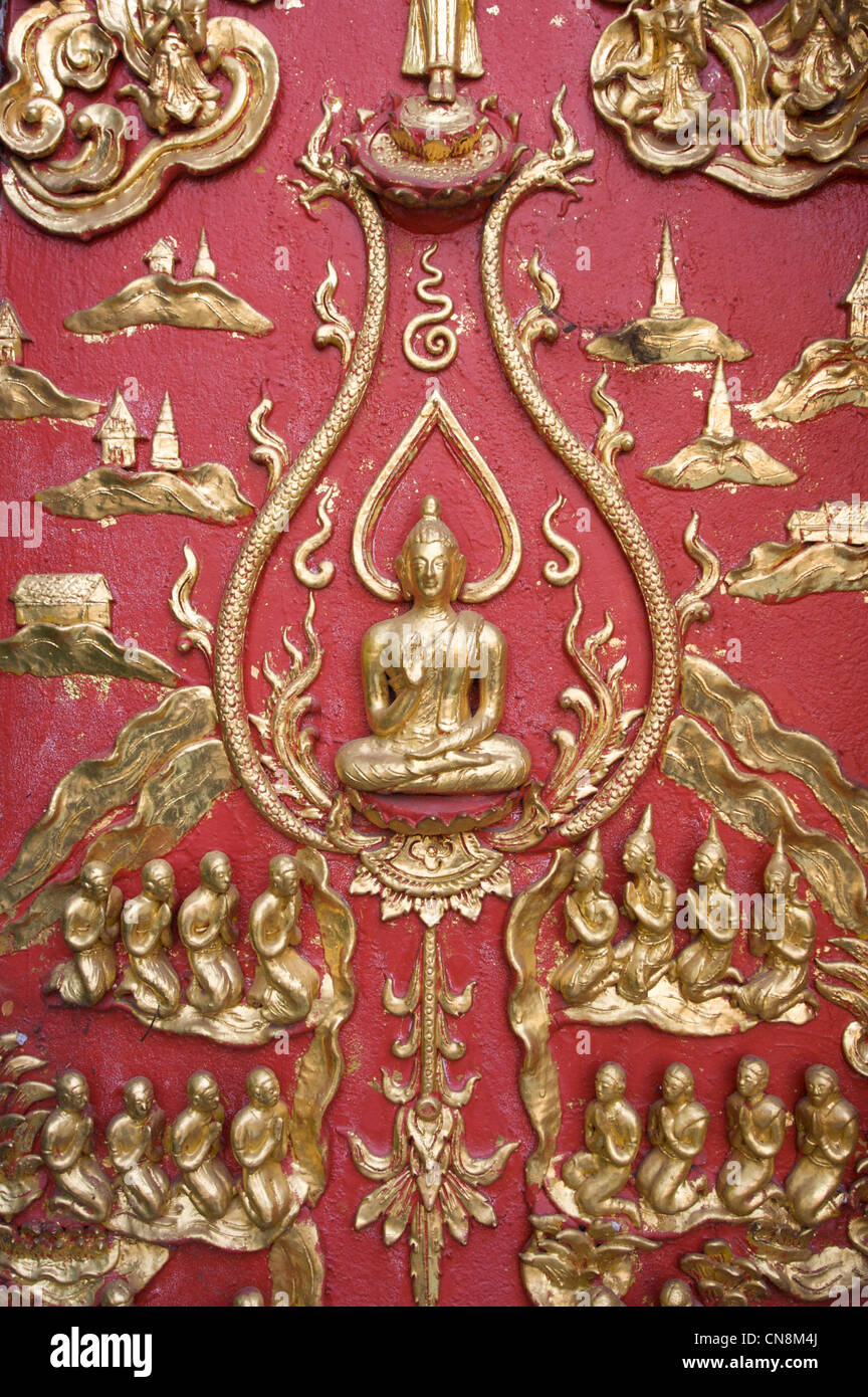 Buddha Bild, eingraviert auf Tempelmauer, Tempel, Chiang Mai, Thailand Stockfoto