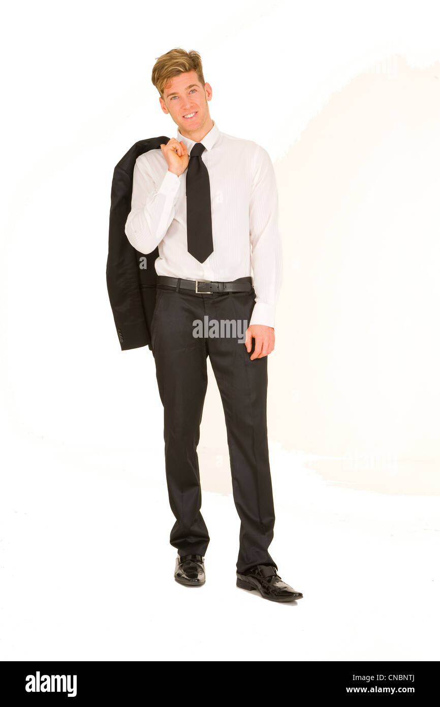 Geschäftsmann mit Jacke über die Schulter Stockfoto