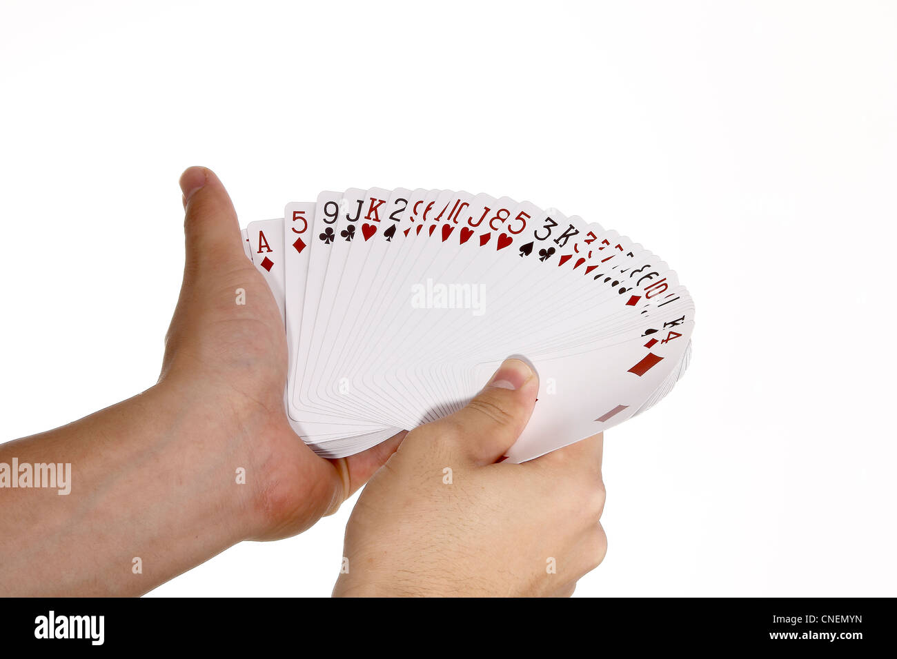 Spielkarten in der hand mit Ventilator verteilt Stockfoto