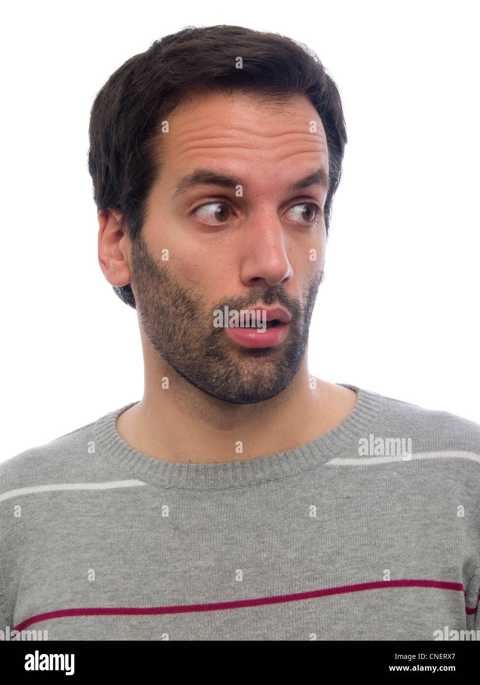 Porträt eines jungen Mannes mit Bart schockiert Stockfoto