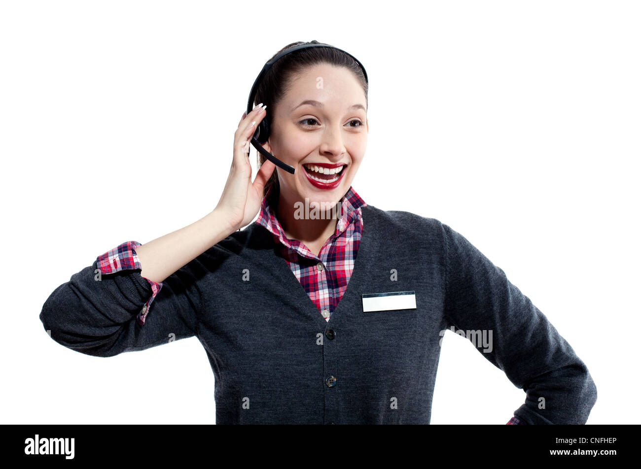 Glückliche junge Frau am Telefon Kopfhörer Stockfoto