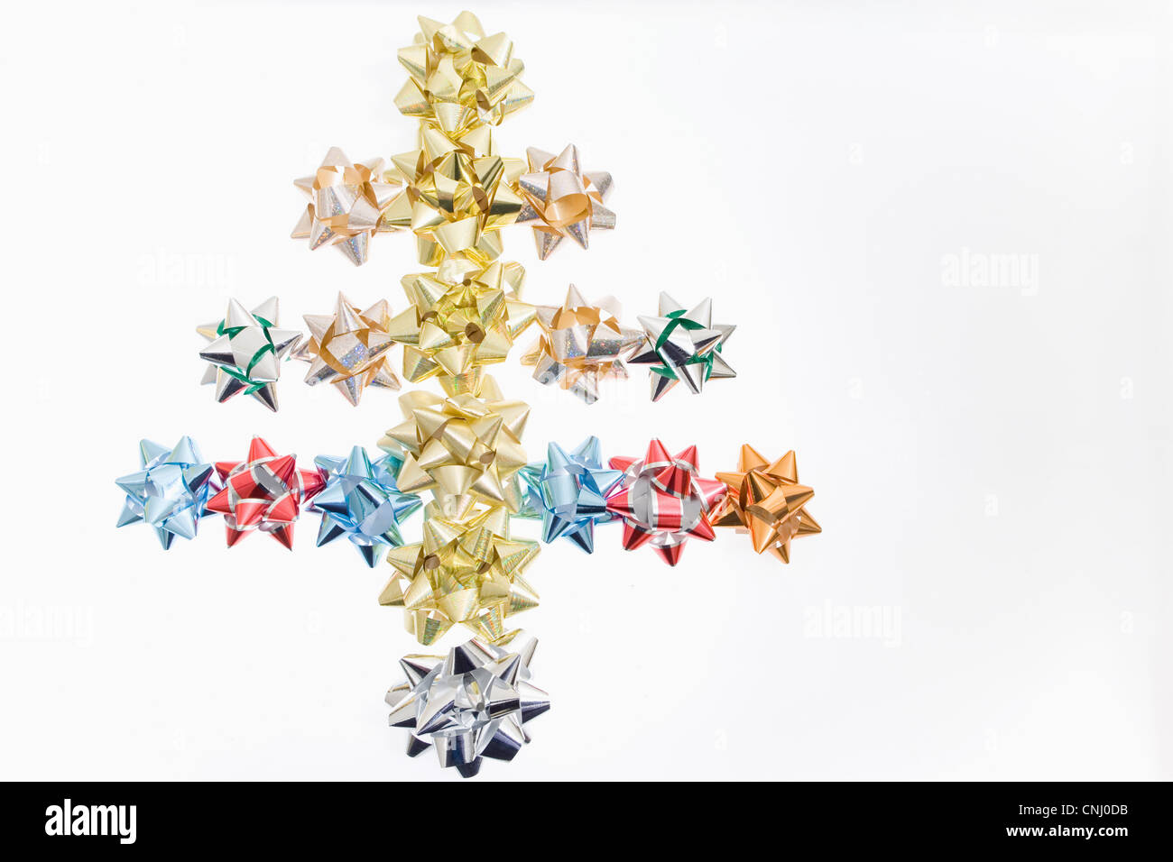 Geschenk-Bögen im Weihnachtsbaum-Form Stockfoto