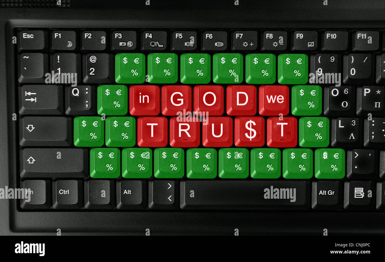 Tastatur mit Slogan "in God we trust" - Konzept der merkantilen und Gier Stockfoto