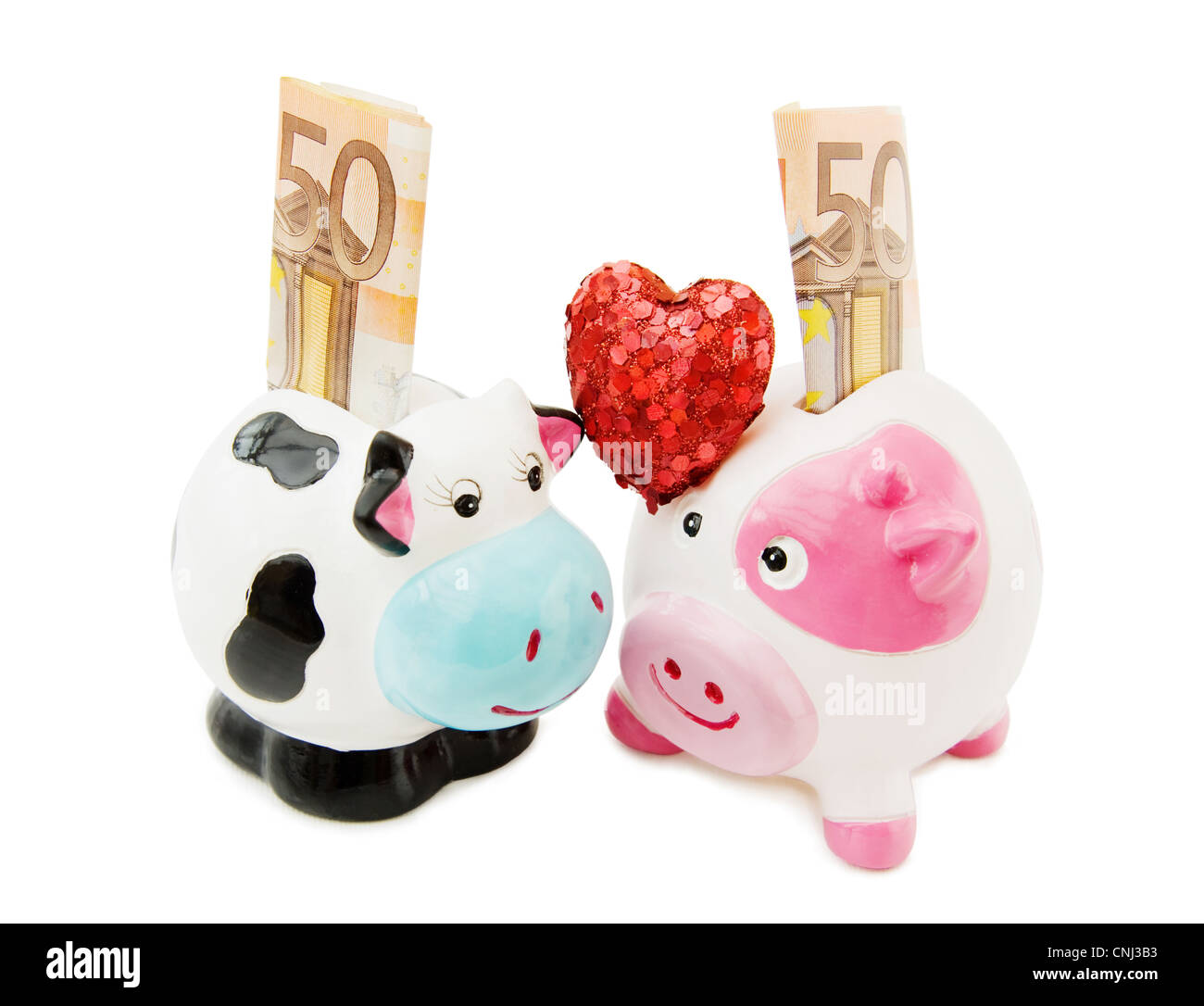 Kämpfen Sie die Wirtschaftskrise zu und fangen Sie Geld zu sparen an. Mit Piggy und Cowie Spardosen. Stockfoto