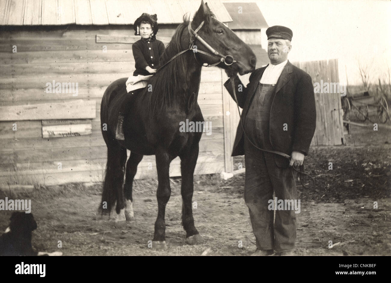 Vater mit Tochter reiten Stockfoto