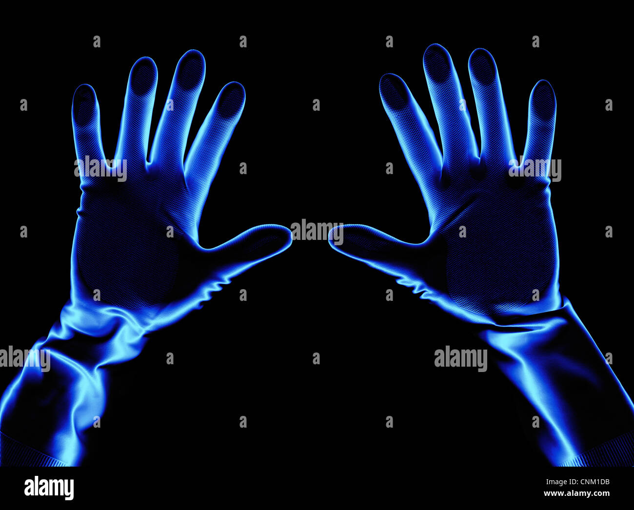 Zwei Hände mit blauen Handschuhen, statt sich um zu ergeben, symbolische Foto Stockfoto