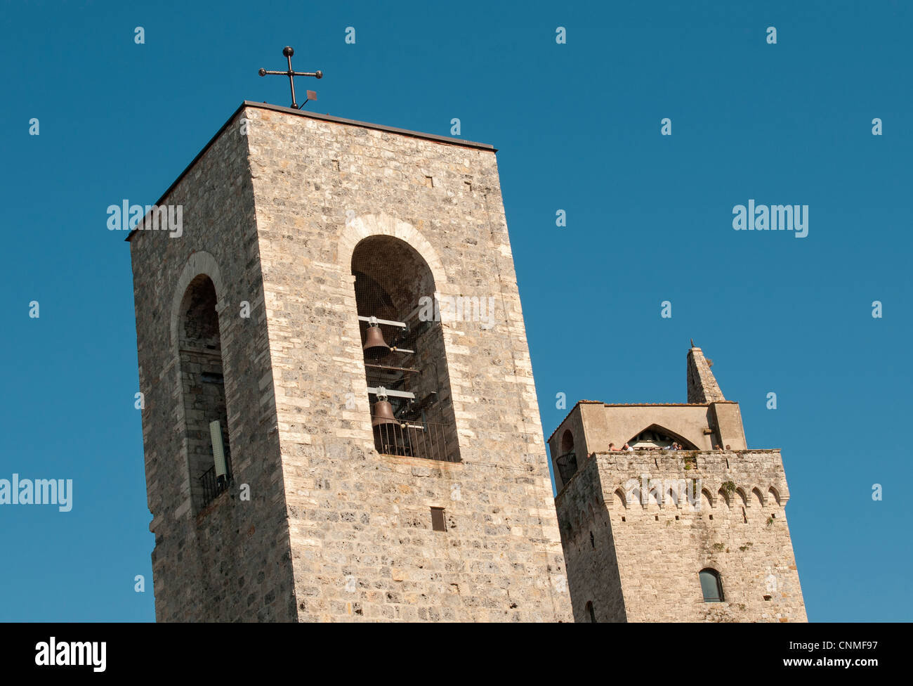 Glockenturm der Collegiata di Santa Maria Assunta Church und Torre Grossa Turm, San Gimignano, Toskana (Toscana), Italien Stockfoto