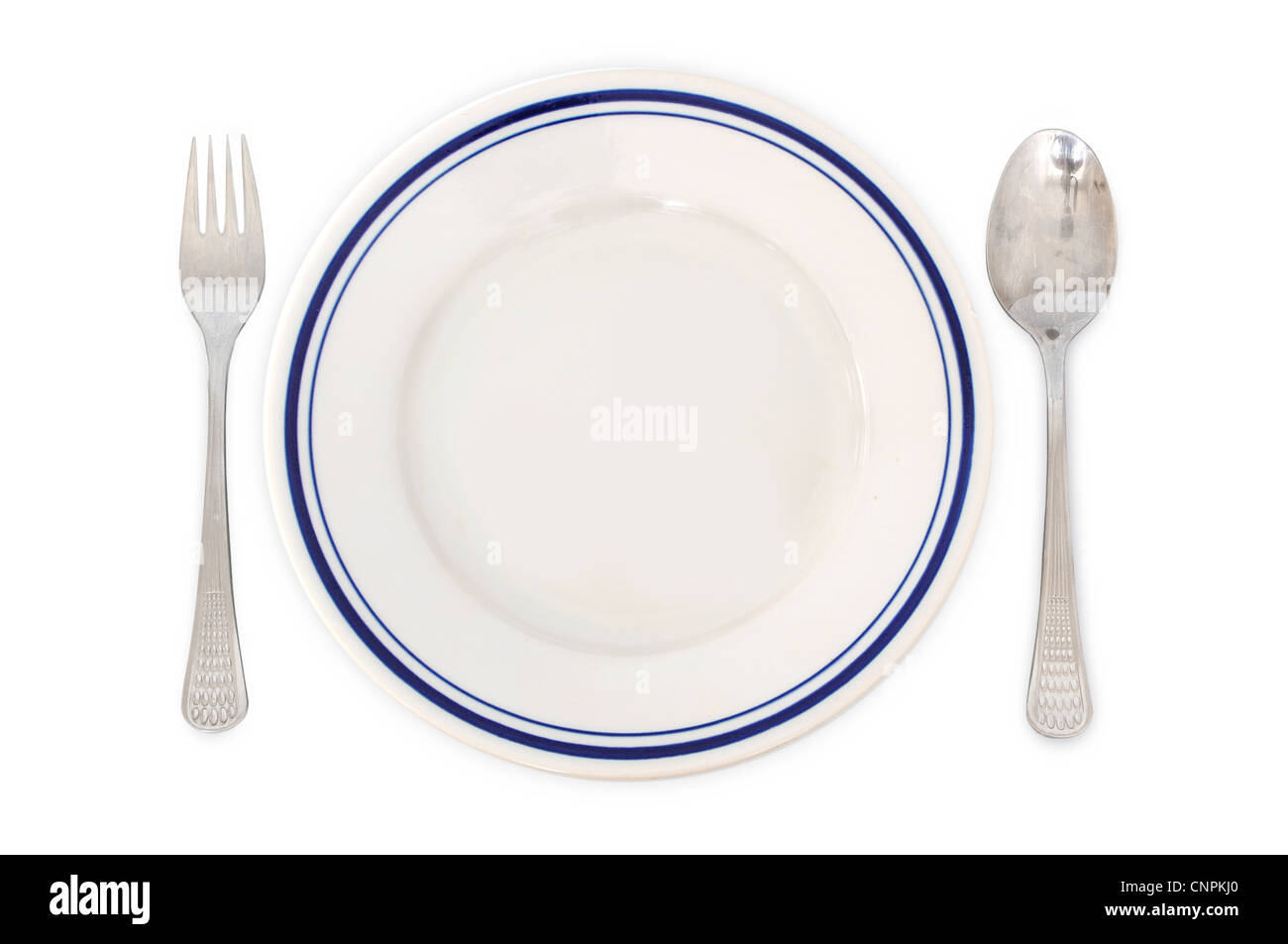 Einfache Anordnung für das Abendessen - Teller, Gabel und Löffel Stockfoto