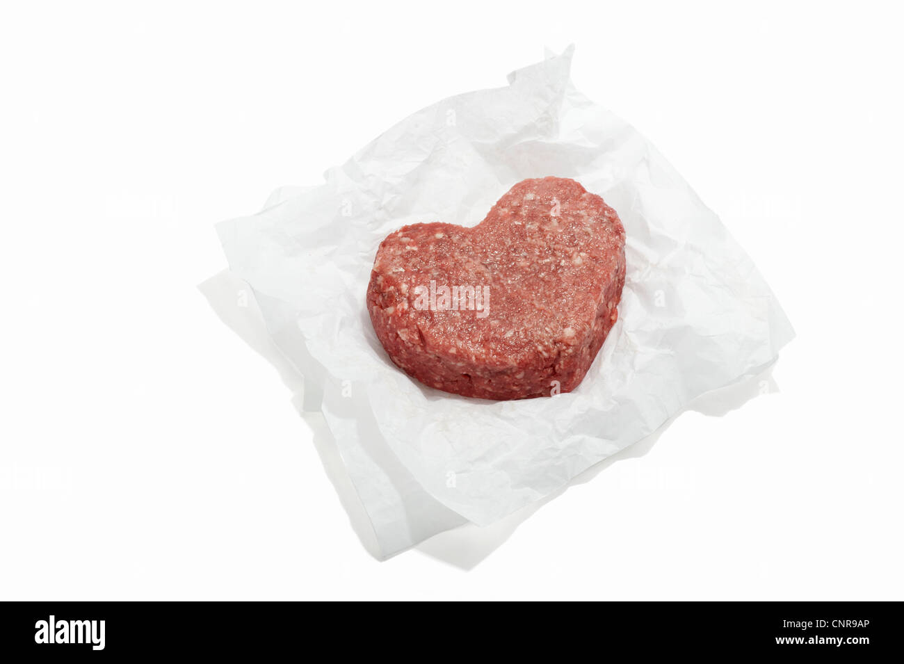Eine herzförmige Beef-Burger auf ein Papierverpackung Stockfoto