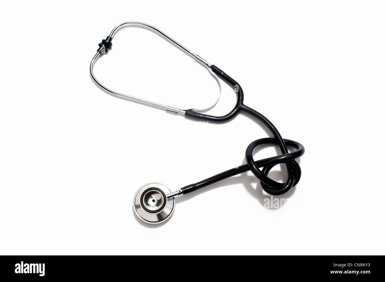 Ein Stethoskop in einen Knoten gebunden Stockfoto