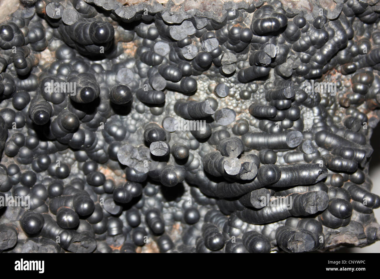 Goethitgruppen Stalaktiten Masse, Restormel Royal Eisenerzmine, Cornwall, UK Stockfoto