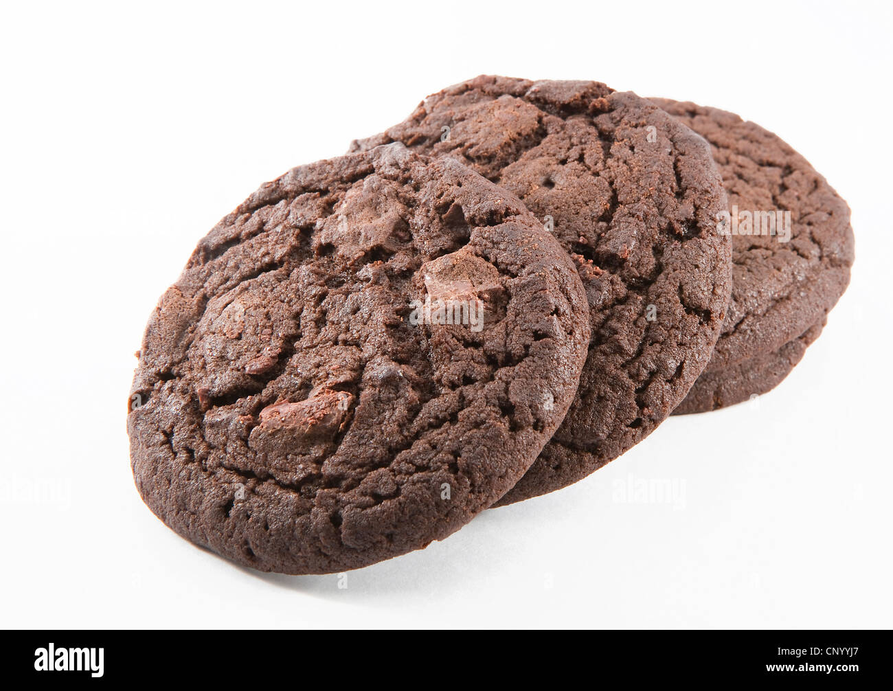 Schokoladen-Plätzchen auf dem weißen Hintergrund Stockfoto