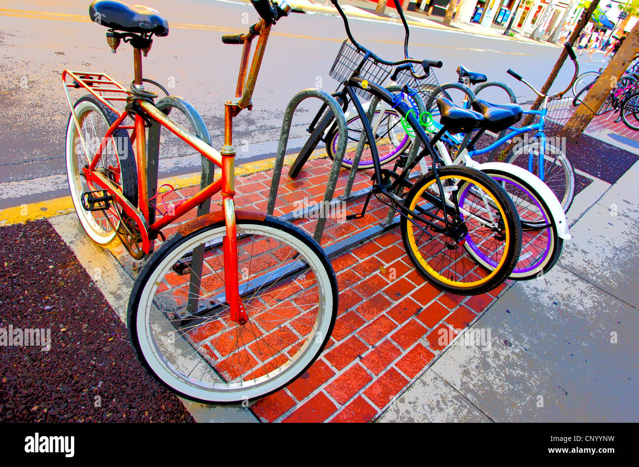 Cruiser erwarten Fahrer auf der Duval Street, Key West, Florida Stockfoto