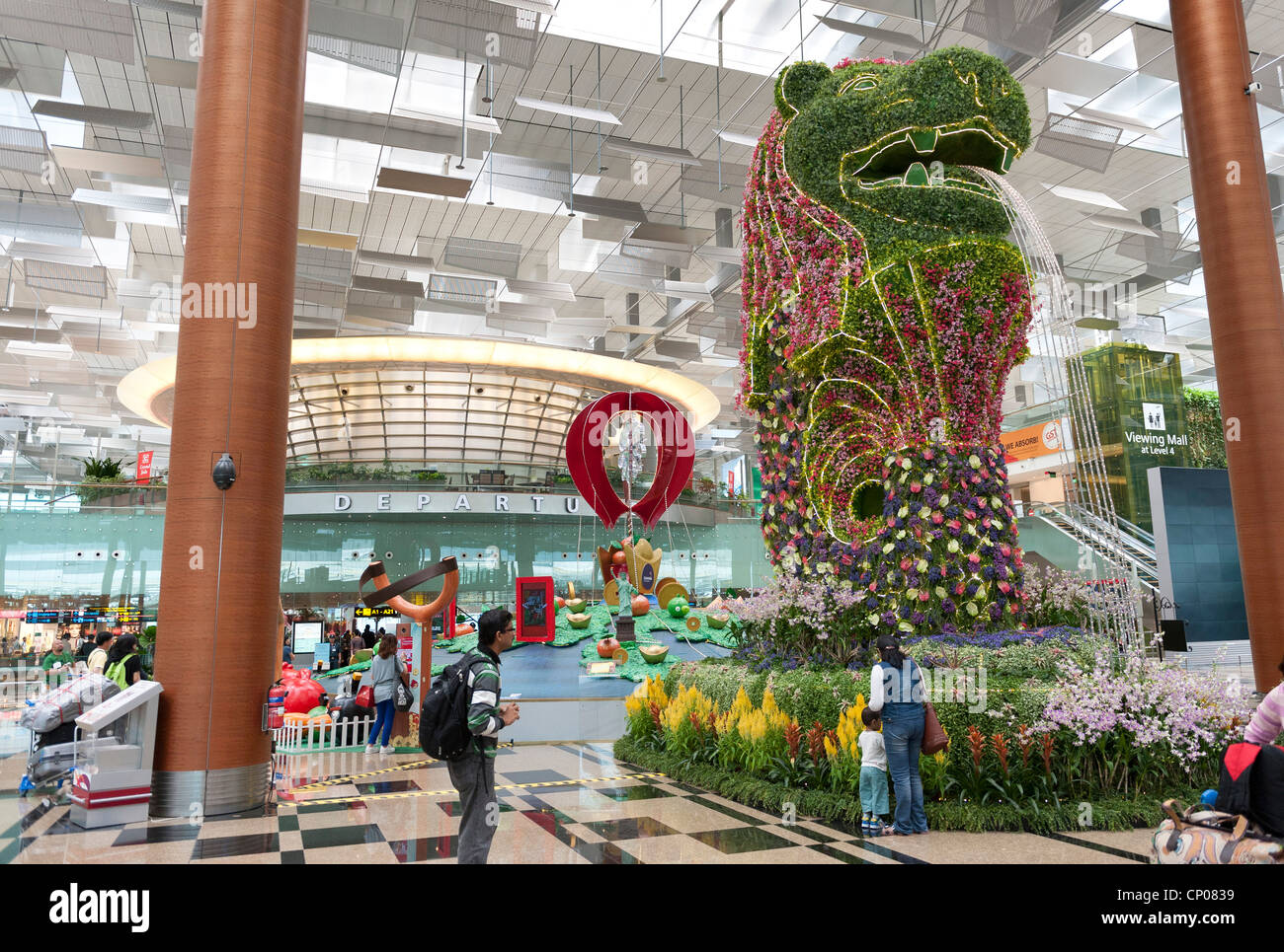 Der Merlion (Maskottchen von Singapur) Blume Anzeige internationaler Flughafen Singapur Changi Stockfoto