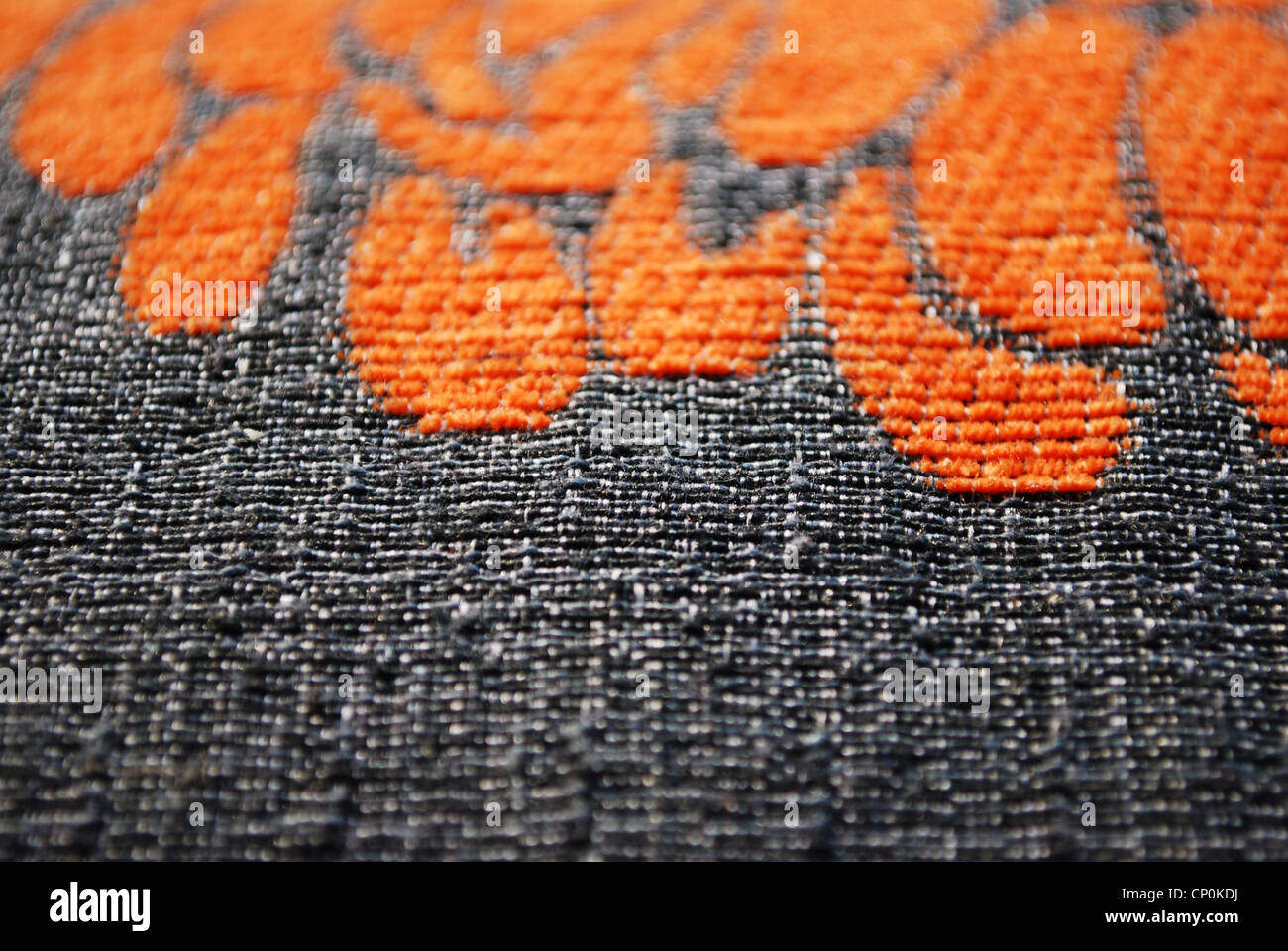 Grau und orange Stoff Textur Makro Detail Hintergrund horizontale Stockfoto