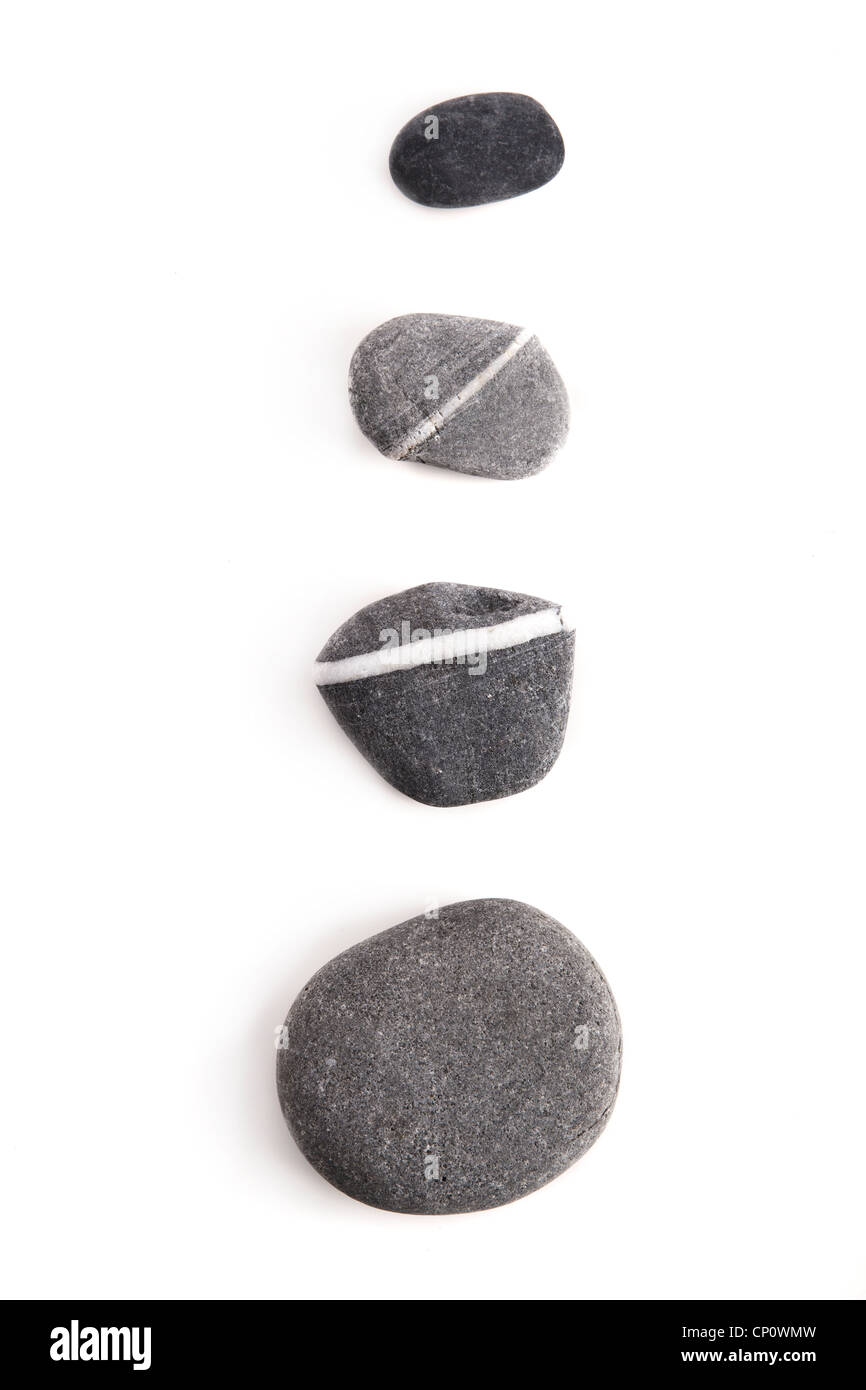Vier schöne Spa-Steinen isoliert auf weißem Hintergrund Stockfoto