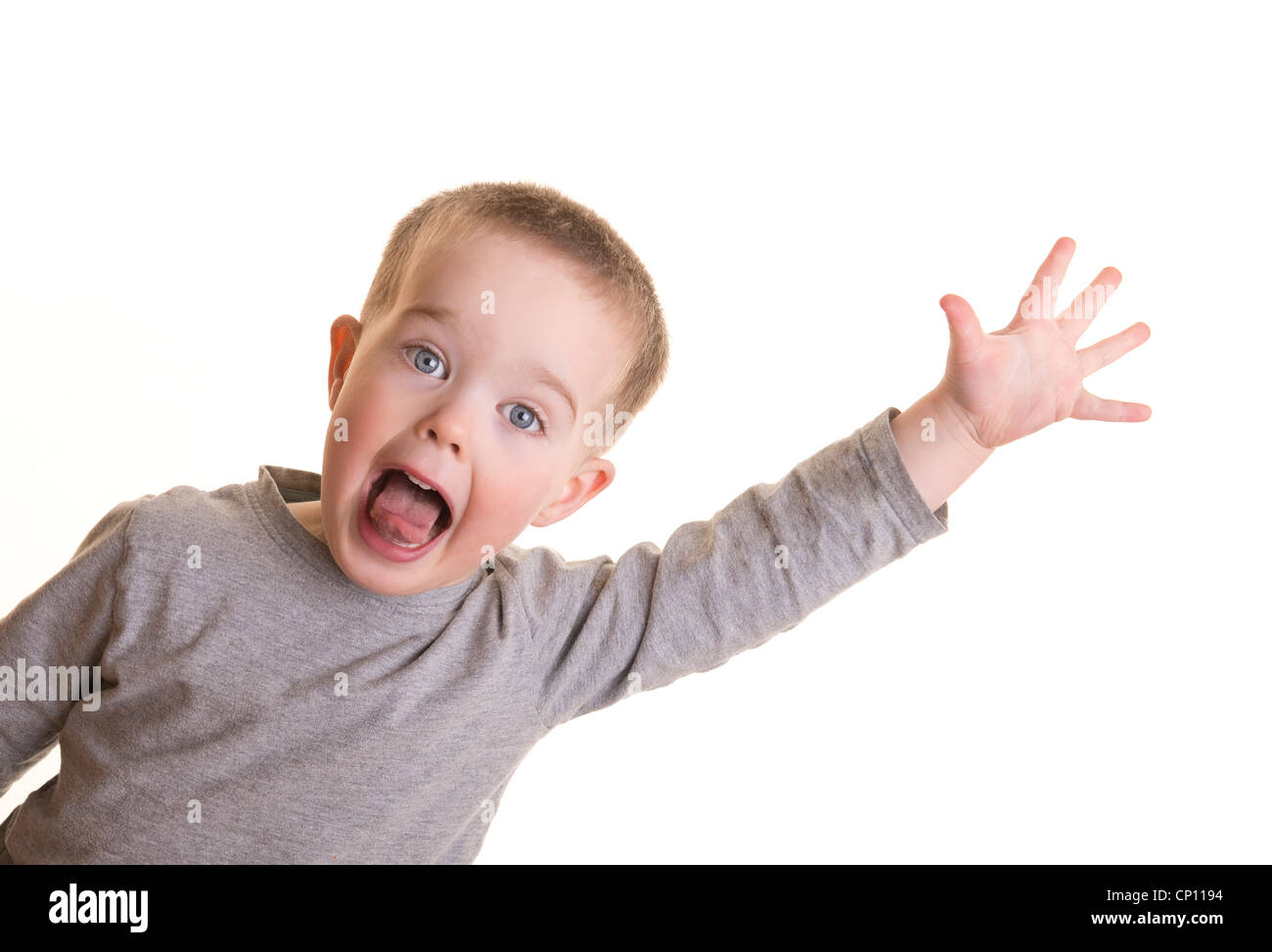 Verrückte gerne blonde Haare blaue Augen Kind winken in die Kamera Stockfoto