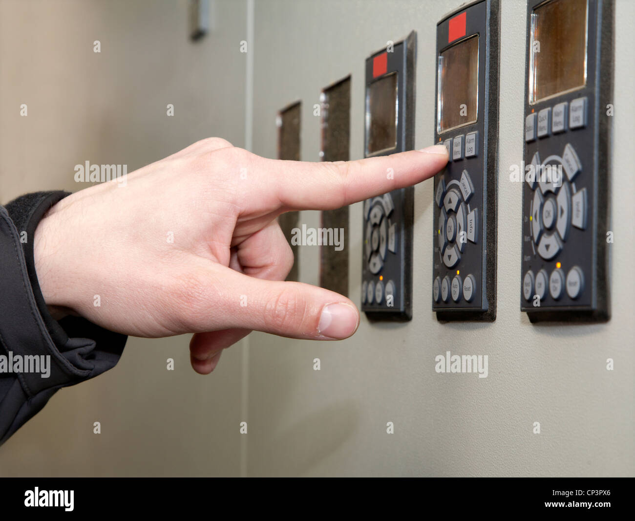 Control Panel und Hand bei der Arbeit Stockfoto