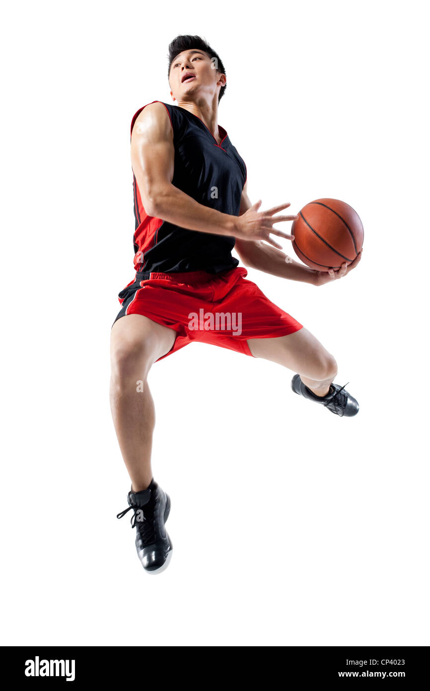 Mann Springen Um Basketball Schiessen Stockfotografie Alamy