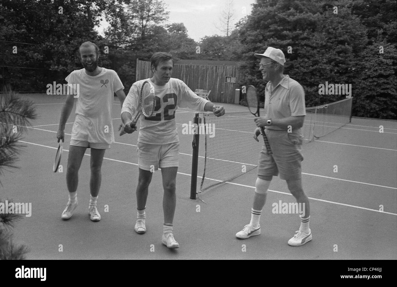 Präsident Ford Stabschef Donald Rumsfeld und David Kennerly White House Fotograf ein Match im Anschluss an das Weiße Haus Stockfoto