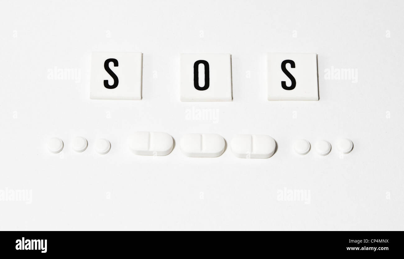 SOS-Code gemacht von Pillen Stockfoto