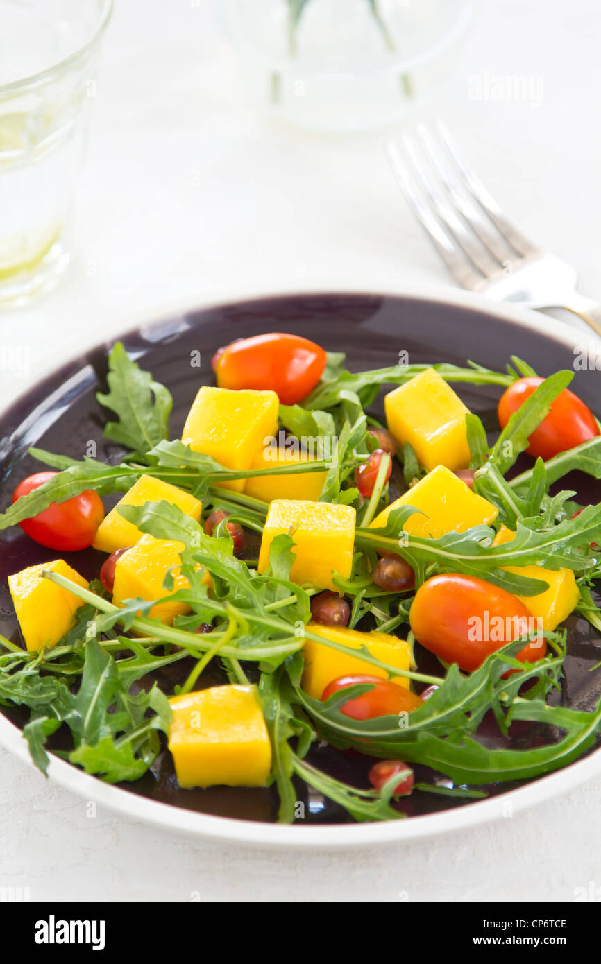 Mango und Rucola Stockfoto