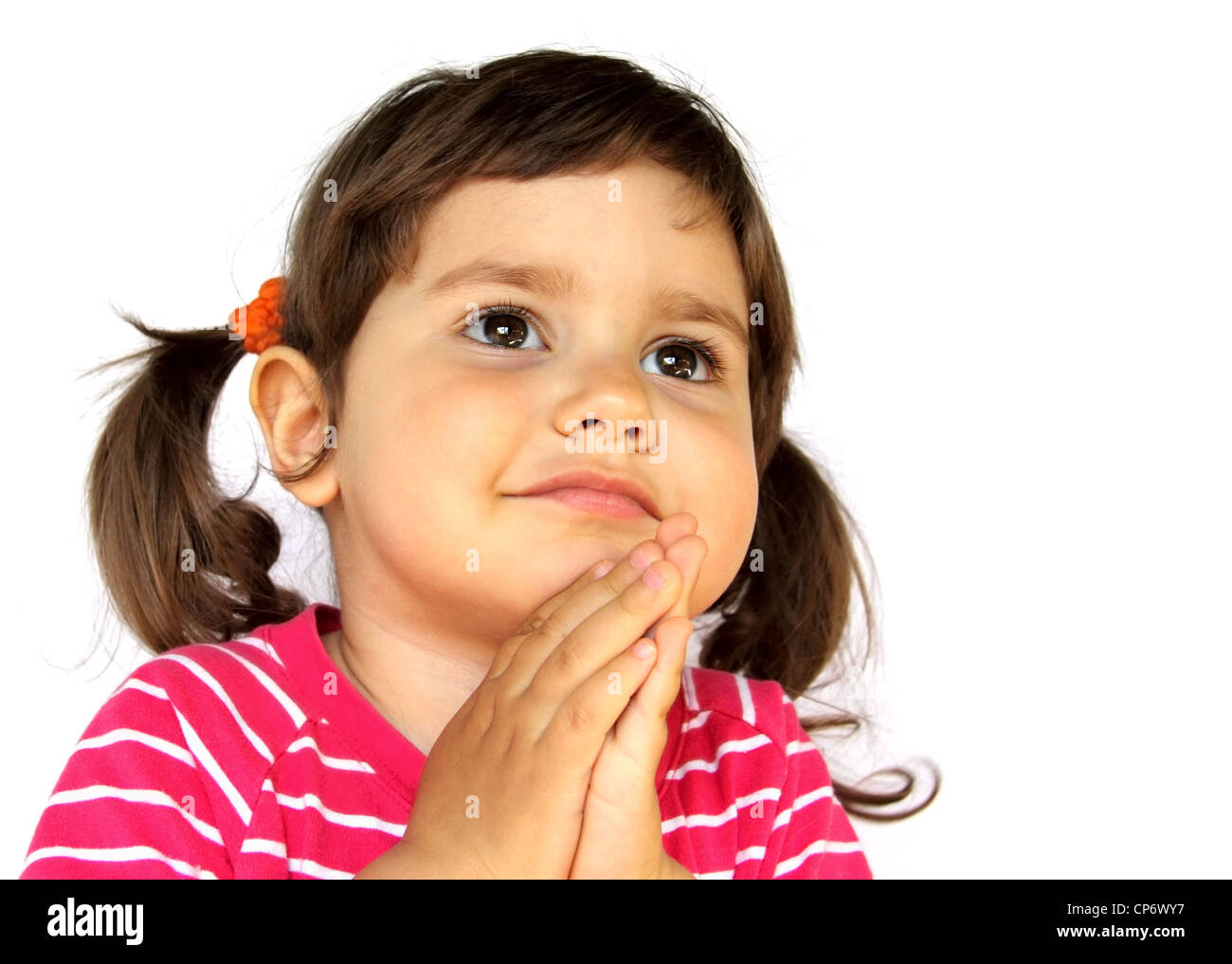 Kleines Mädchen beten oder machen eine Wunsch-Portrait Stockfoto
