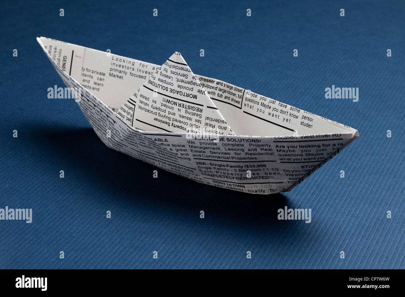 Zeitung Boot, Business-Konzept. Stockfoto