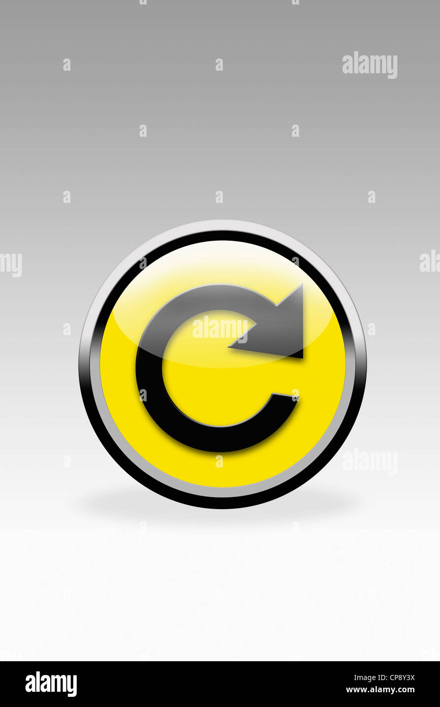 Gelbe Taste mit Pfeil-Symbol, Nahaufnahme Stockfoto