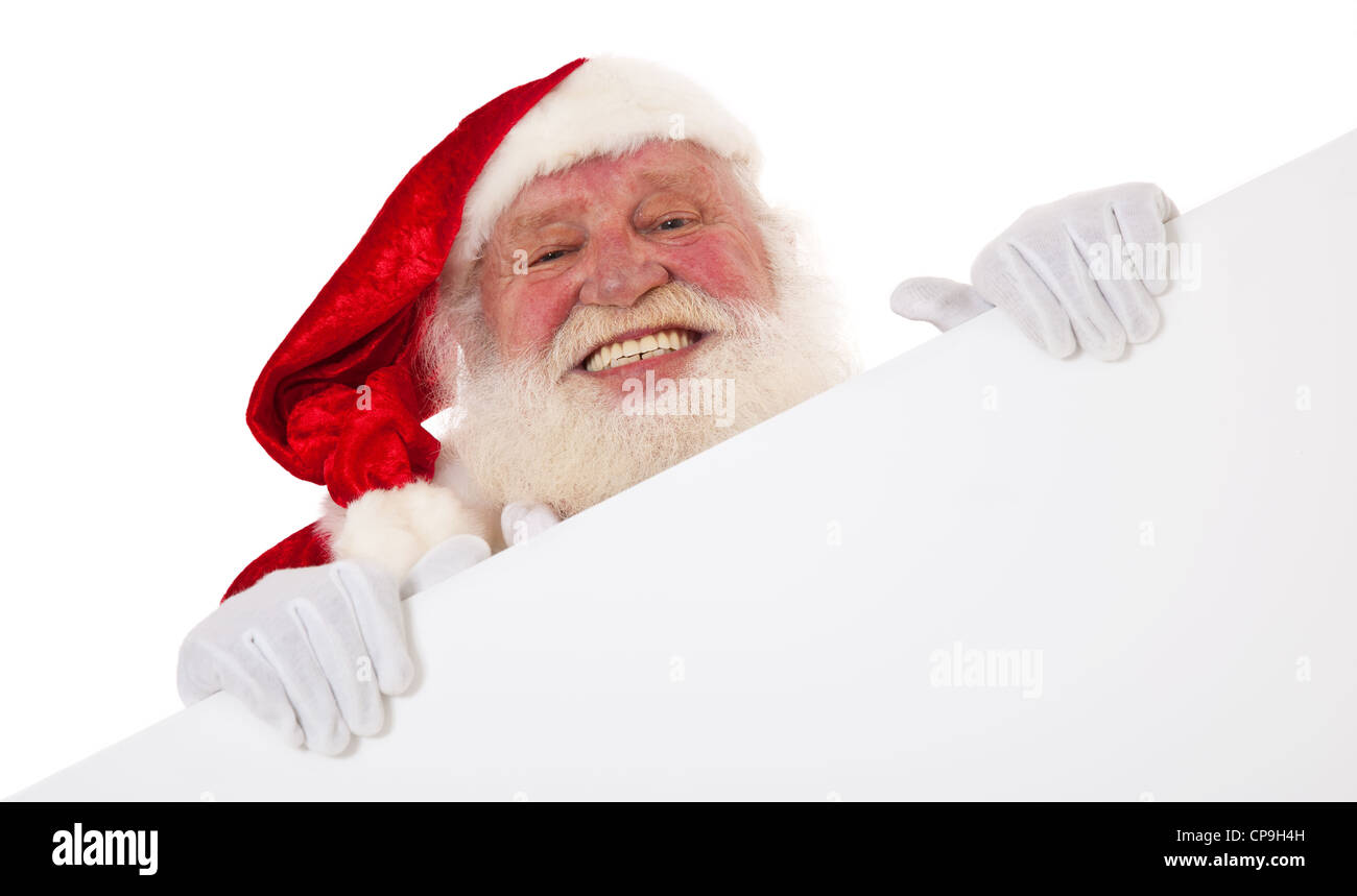 Santa Claus in authentischen Look hinter weißen Schild. Alle auf weißem Hintergrund. Stockfoto