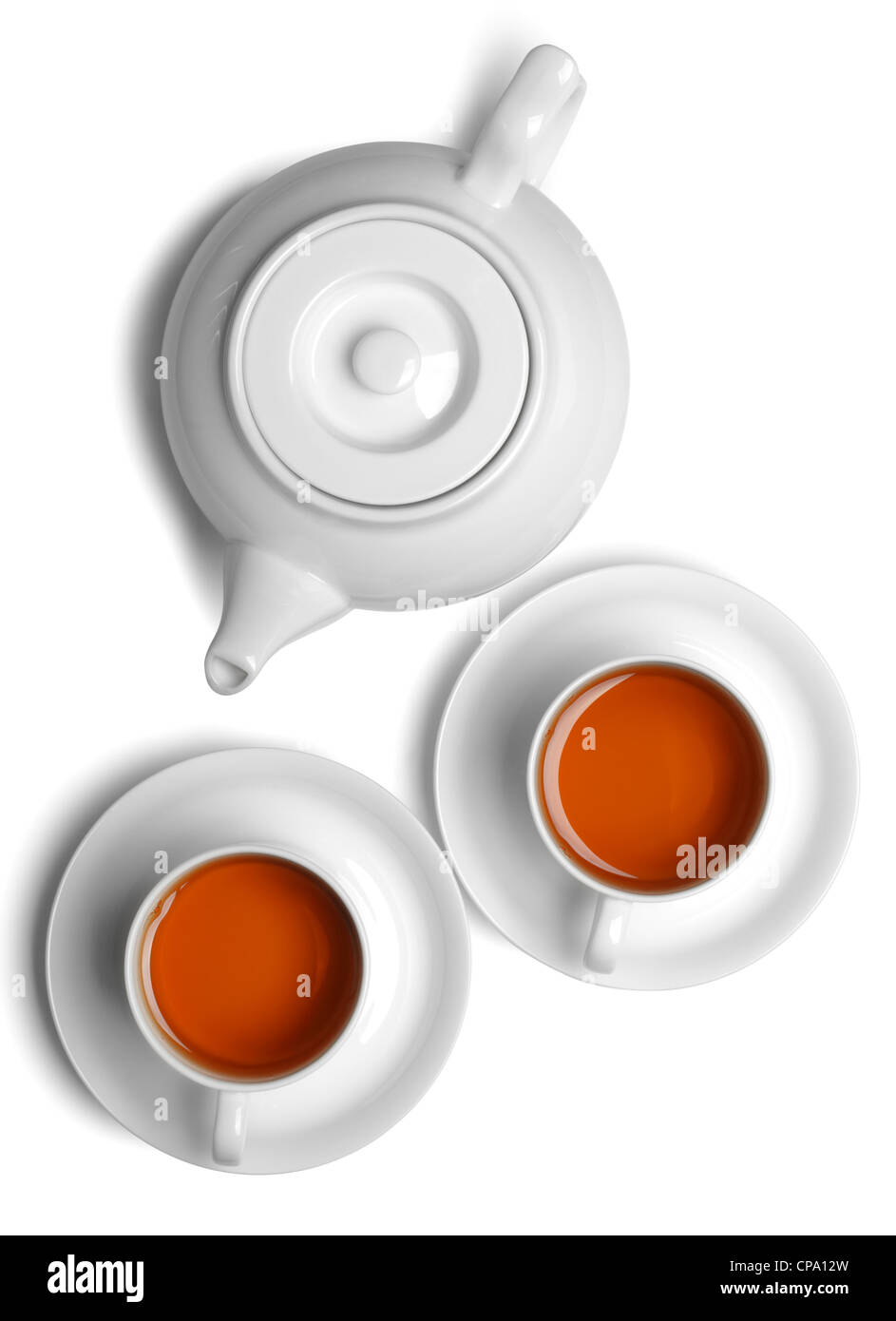 Tasse Tee mit Teekanne isoliert auf weiss. Stockfoto