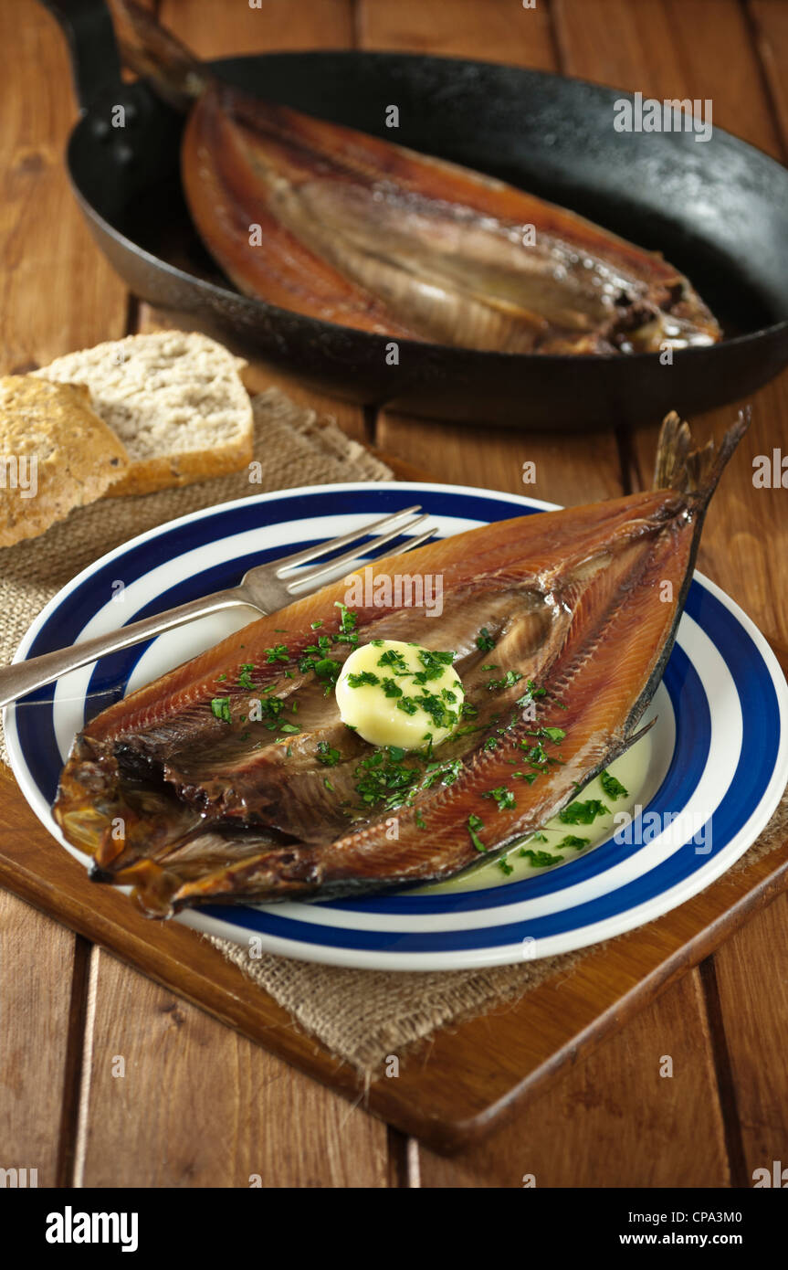 Bückling geräuchert Heringe auf Platte Stockfoto
