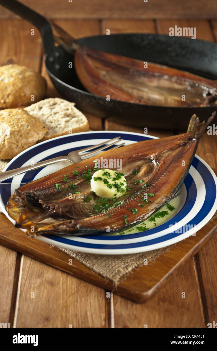 Bückling geräuchert Heringe auf Platte Stockfoto