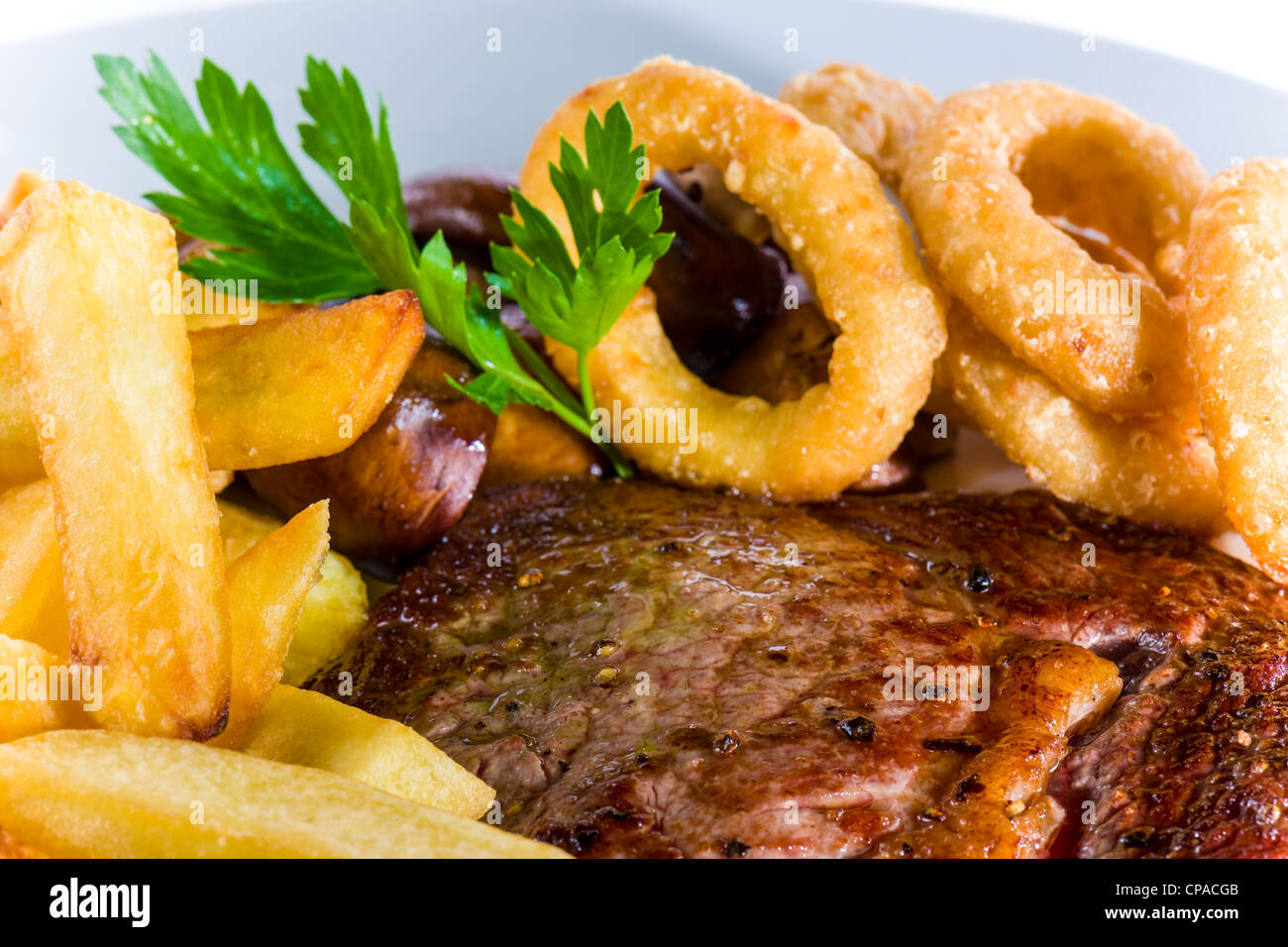 Kochs Präsentation Gericht - Steak und Pommes frites Stockfoto