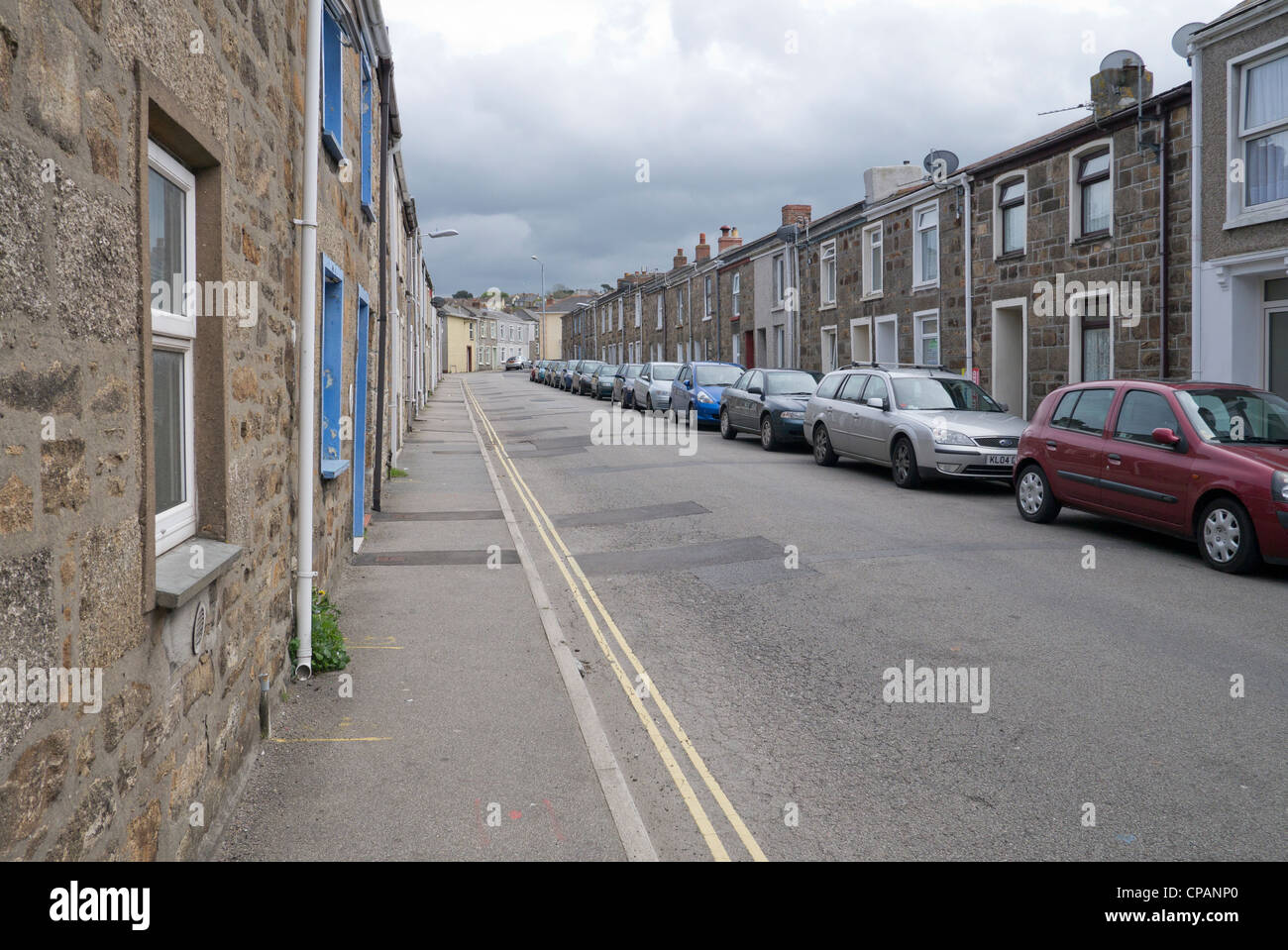 Tolcarne Straße, Stein traditionelle Cornish Reihenhäuser in Camborne, Cornwall UK Stockfoto