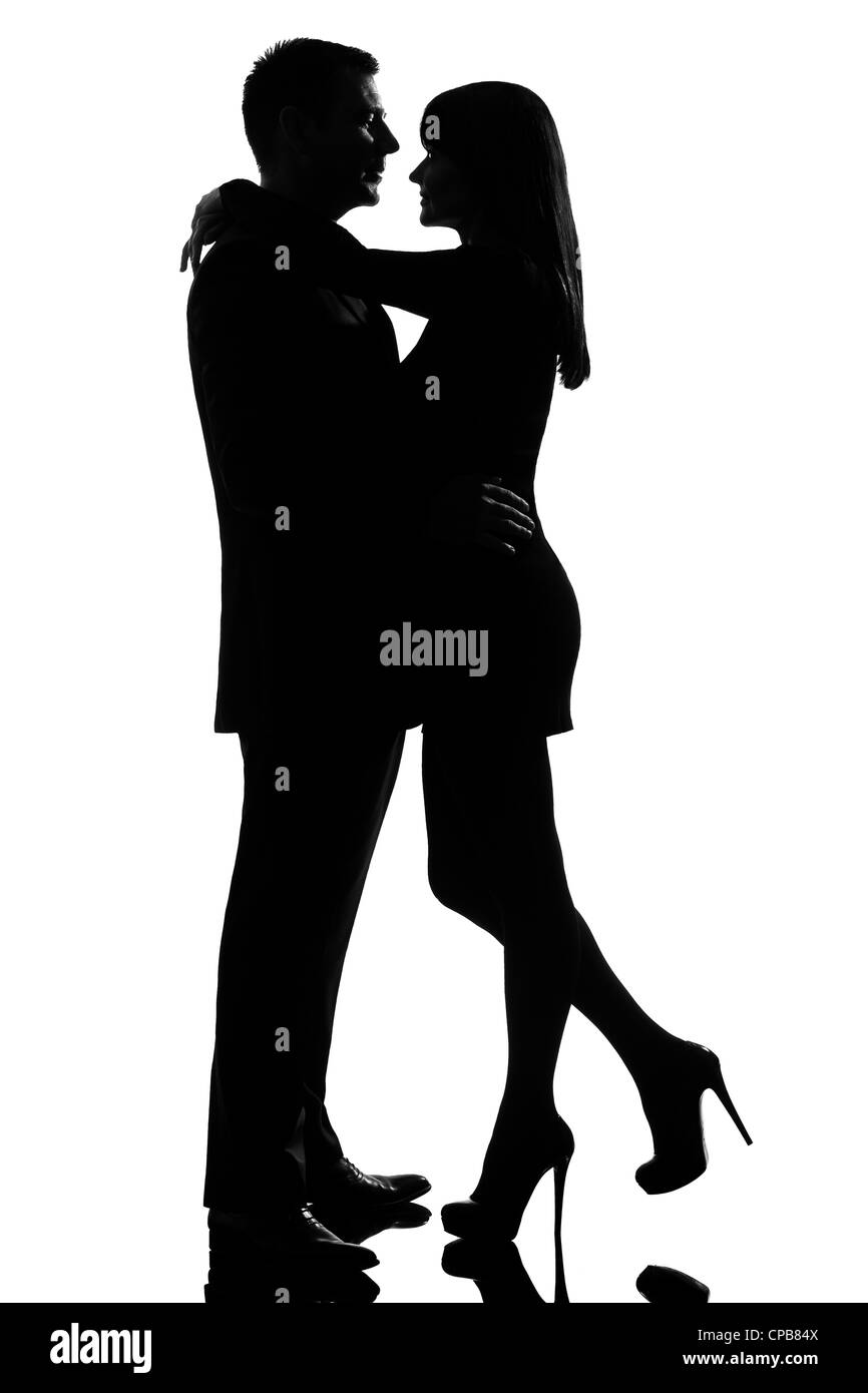 einem kaukasischen Liebhaber paar Mann und Frau umarmt Zärtlichkeit Studio Silhouette isoliert auf weißem Hintergrund Stockfoto