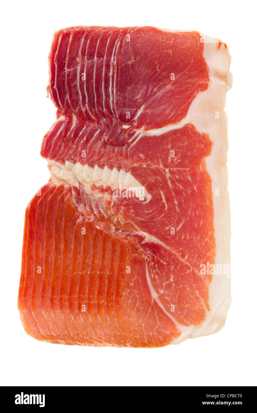 Scheiben von Jamon Serrano, trocknen spanischen Schinken, isoliert auf weiss Stockfoto