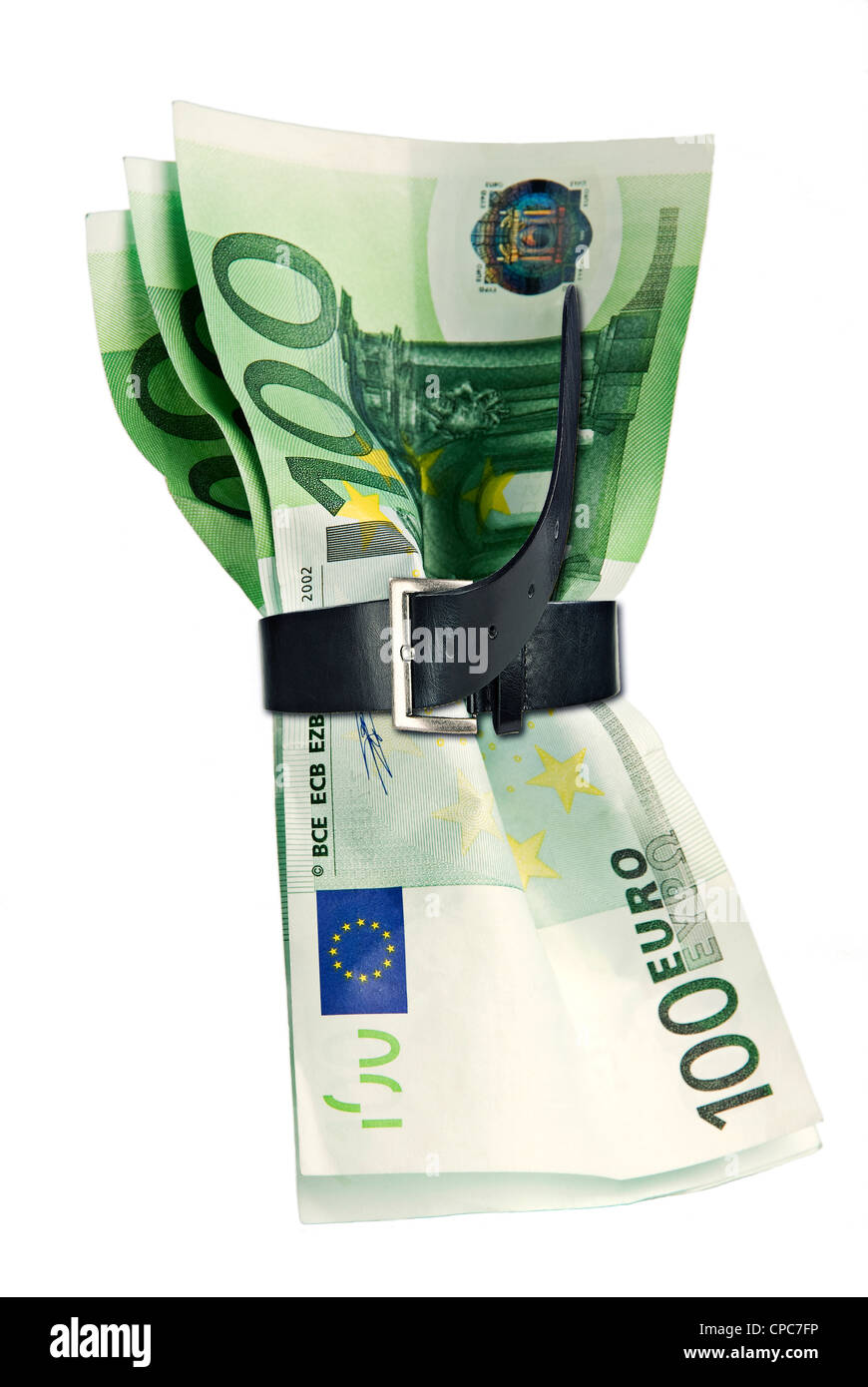 Euro-Noten sind zusammen mit einem Gürtel gebunden. Stockfoto