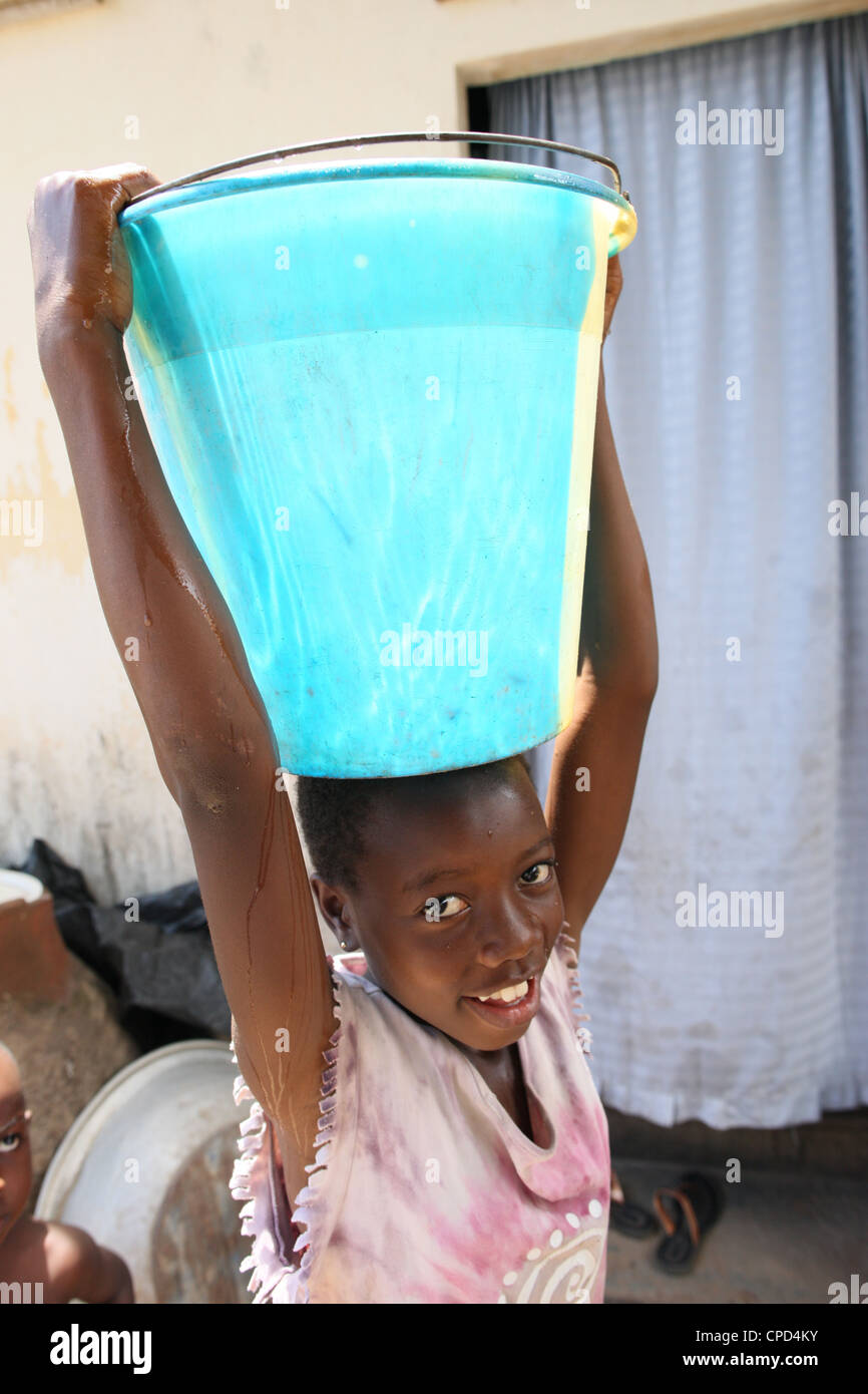 Afrikanischen Kindes gesponsert von einer NGO, Lome, Togo, Westafrika, Afrika Stockfoto
